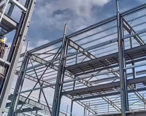 OEMの耐火性のプレハブの倉庫のオフィスの鉄骨フレームの小屋は家のキットを組立て式に作った